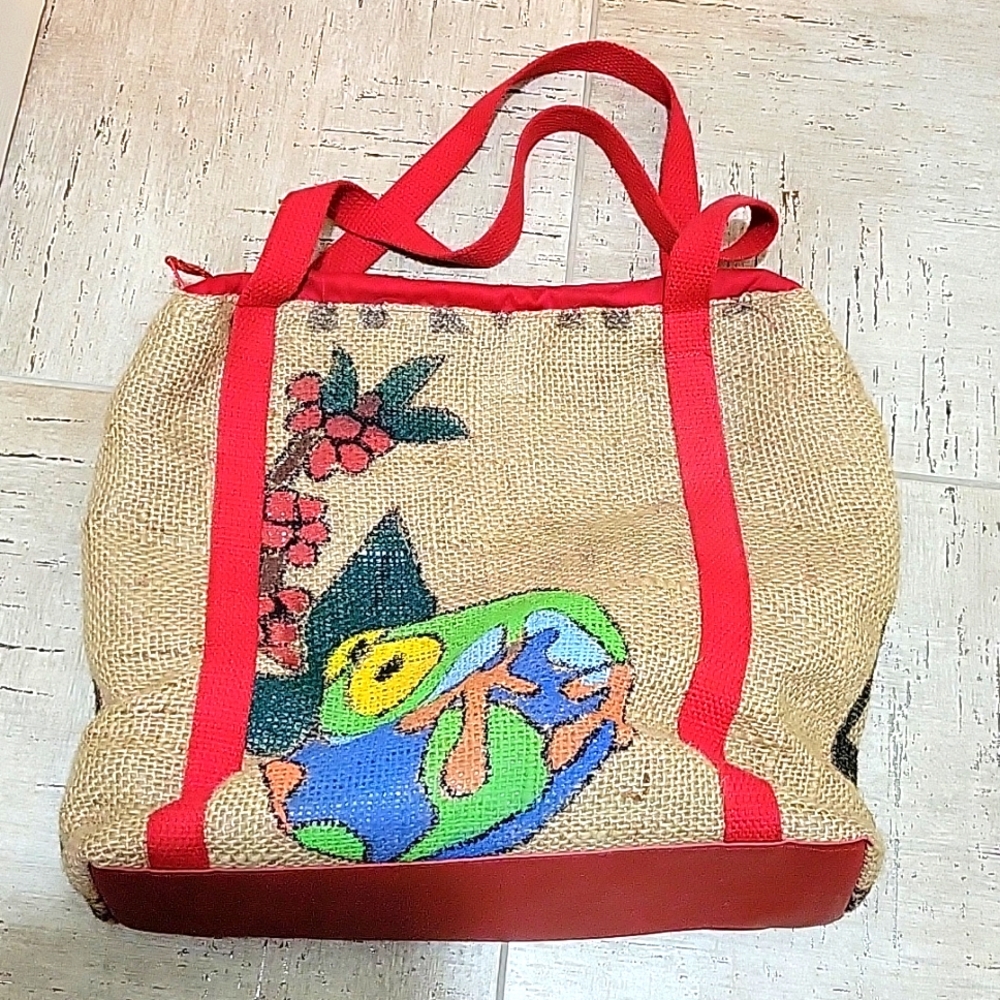 Vintage burlap tote with frog design. Bright yellow lining with inside pockets.